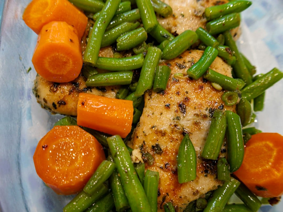 Kid-Friendly Crock Pot Meals: 10 Easy Slow Cooker Dinners 2 Slow-cooked chicken with tender carrots and green beans for a kid-friendly family dinner